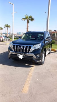 برادو TXL • ٢٠١٤ • نص الدعامية الخلفية