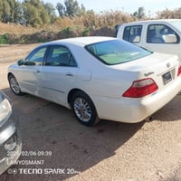 بڕاوە • ٢٠٠٦ • دوو دوگمە