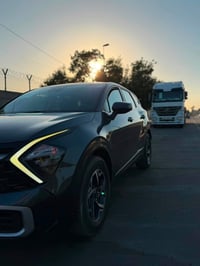 سبورتج 2023 وارد امريكي   صبغ بند فقط   مواصفات الستندر ماشيه 47000 مي...