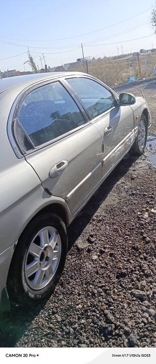 كيا اوبتما 2004 للبيع سياره جاهزه حداديه تبريد كهربائية فول مكاني ذي قار الفجر السعر 65 وبيه مجال للشراي وهذا رقمي ***********
