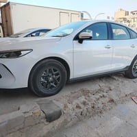 جنبلاص • جينيسيس • سيارة • بغداد • 4000 كيلو متر • داخل احمر
