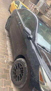 كيا ريو موديل 23رقم بغداد لون اسود مثل ما موضح بلصوره مكاني الشعب للاس...