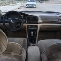 مازدا فاصوليا 1998  محرك وگير مكفول 4 سلندر سنوية 2029 تدفئة تبريد  كه...