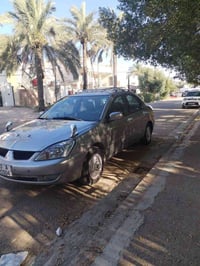 لانسر ٢٠٠٢ • محدثه ٢٠١٠ • كير اوتوماتيك