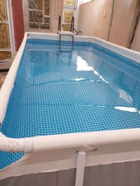 مسبح نفخ • ٤×٢×١٫٢٢م • نضيف