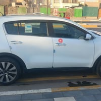 سبورتج 2017 خليجي ابيض  ماشية   111  الف كيلو فقط  محرك 2000  رقم بغدا...