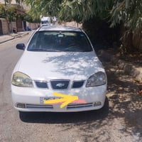 اوبترا ٢٠٠٤ • ابيض • رقم انكليزي
