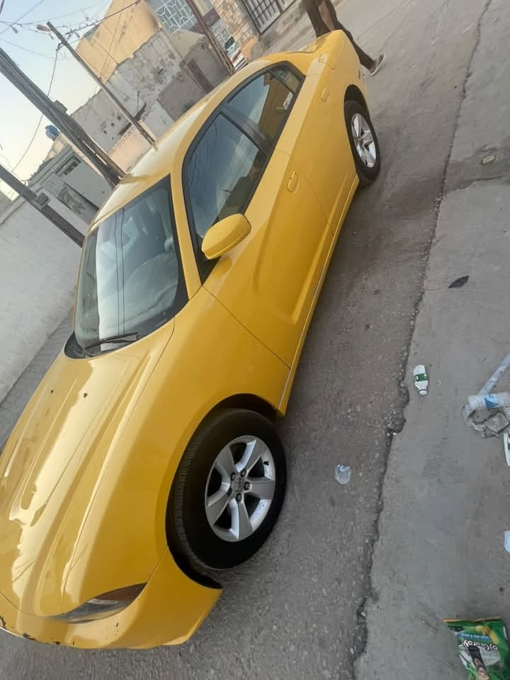 السلام عليكم جارجر للبيع موديل ٢٠١٤ وارد امريكي بدون حادث بيه طخه زغيره الجاملغ الخلفي يم قبق البانزين الباقي كفاله محرك جديد منظومه تبريد جديده حداديه اكسل كله جديد فقط الگير بي عته رقم بغداد الدولي بأسمي السعر 167$ رقم الهاتف ***********//***********
