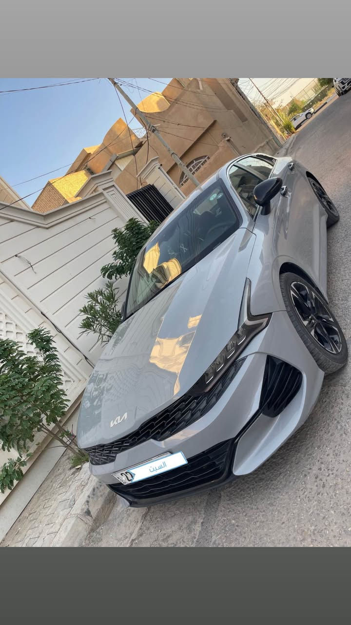 كيا K5 موديل 2022  اسمنيتي مواصفات GTلاين فول مواصفات عداالبانوراما بصمة كراسي جلد كهرباء كشنات تدفئة 5وضعيات قيادة ويل كب رياضي قيادة ذاتيه توقف ذاتي رادارات جانبيه  ورادار امامي اوتو ستوب كير ٨سرعات دبل كلج محرك 1600 تيربو السيارة جاهزة وما بيه نقص اي شي محرك كير كفالة بلادي شركة تبريد ثلج رقم اربيل الدولي هزة ورقم وسنوية كولة جديد السيارة حادثة جاملغ وبنيد بدون دواخل شاصي وراديترات بلادي مملعوب بيهن مكاني كربلاء *********** كربلاء, العراق
