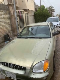 سوناتا للبيع مكفولة من الصبغ والضربة القوية موديل 2000 رقم بغداد كير و...