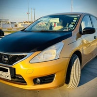 ‎نیسان تیدا خەلیجی بۆ فرۆشتن ‎مۆدیل 2014 پشت و پێشی كەپس  ‎دوو پارچە س...