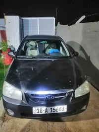 للبيع كيا سبكترا موديل 2006 مصبوغه حزام لون رصاصي رقم بابل دولي كير او...