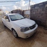 اوبترا 2013 كير عادي سياره بيها ثلاث قطع تبديل شرط بلا دواخل وبالا شاص...