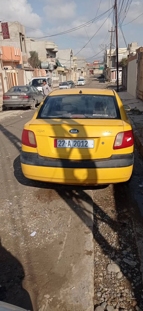 كيو  ريو الفين وثمانيه باسمي سنويه 2030 كاربون الكتروني السعر 73 وبيه مجال  اي استفسار رقم واتساب /اتصال *********** /الموصل الجانب الايمن السياره  موجوده
