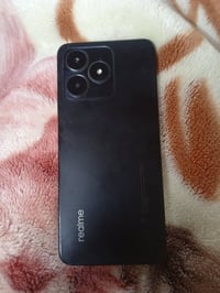 ريلمي • ١٢٨ • مكفول