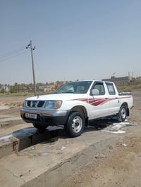 نيسان ٢٠٠٠ • كفاله عامه • رقم بغداد