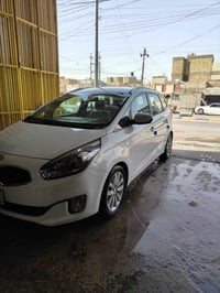 كيا كارنز سبعه راكب موديل 15جديده السياره بمعنى الكلمه گير مكينه تبريد...