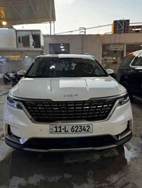 كيا كرنفال برسج  موديل23 فتحتين موجود   8 راكب تبديل بابين زيرو ابيض ط...