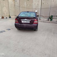 كورلا 2004 رقم بغداد الدولي محرك 1800 فول مواصفات بسمي السعر 77 وبيه م...