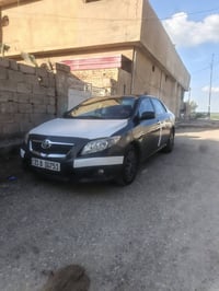 كورولا.البيع وارد امريكي موديل  2010 السعر وبيه مجال 110 07811538896