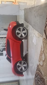 سيارة أطفال • كهربائية