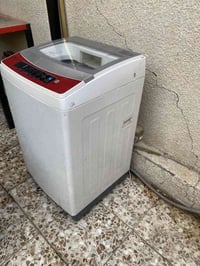 غسالة اوتوماتيك نظيفة كلشي مابيهة مجرد القاعدة اليسار متاكلة شوية  نظا...