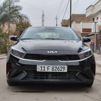 كيا فورتي موديل 2024 لون اسود رقم بغداد الدولي الجديد بأسمي السياره ان...