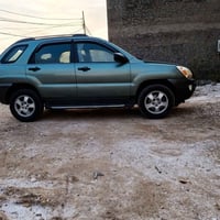 كيا سبورتج موديل 2007 محرك 2000 مصبوغة قطع بس ابيعلك مصبوغة احزام وارد...