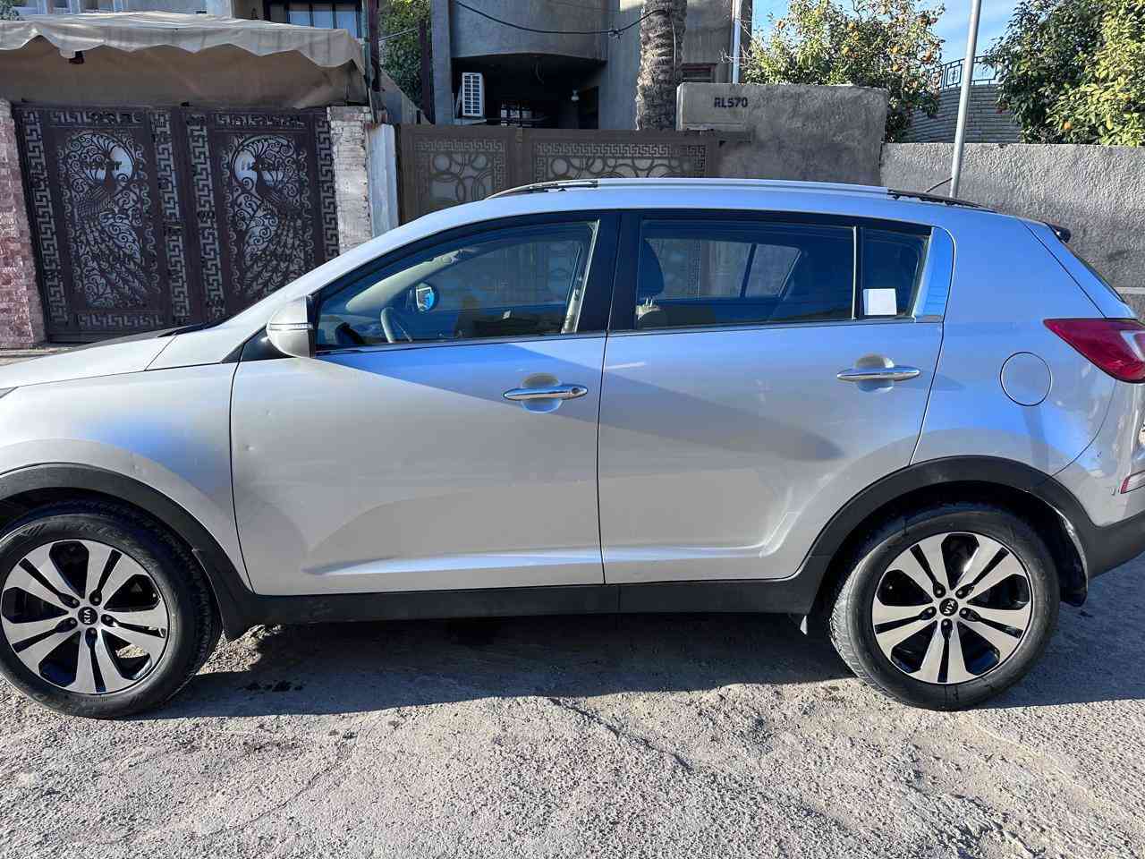 سبورتج موديل ٢٠١٢ للبيع السياره مكفوله من الصبغ والتبديل بيها بارد قليل بلجنطه مكان السياره بغداد السعر١٣٩ للاتصال***********
