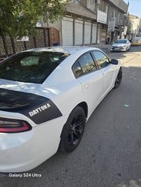 جارجر 2020 SXT رقم بغداد بسمي  مكينة ٦ سلندر  توويل حادثه 5 قطع صبغ ما...
