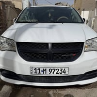 دوج كرفان SXT 2016 ابيضّ وارد أمريكي محرك 6 سلندر 7 راكب باب كهربائي ص...