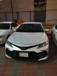 كاميري هايبرد موديل 22 Xle ماشية 138,000 كم معروضة 185ورقة بيها مجال ل...