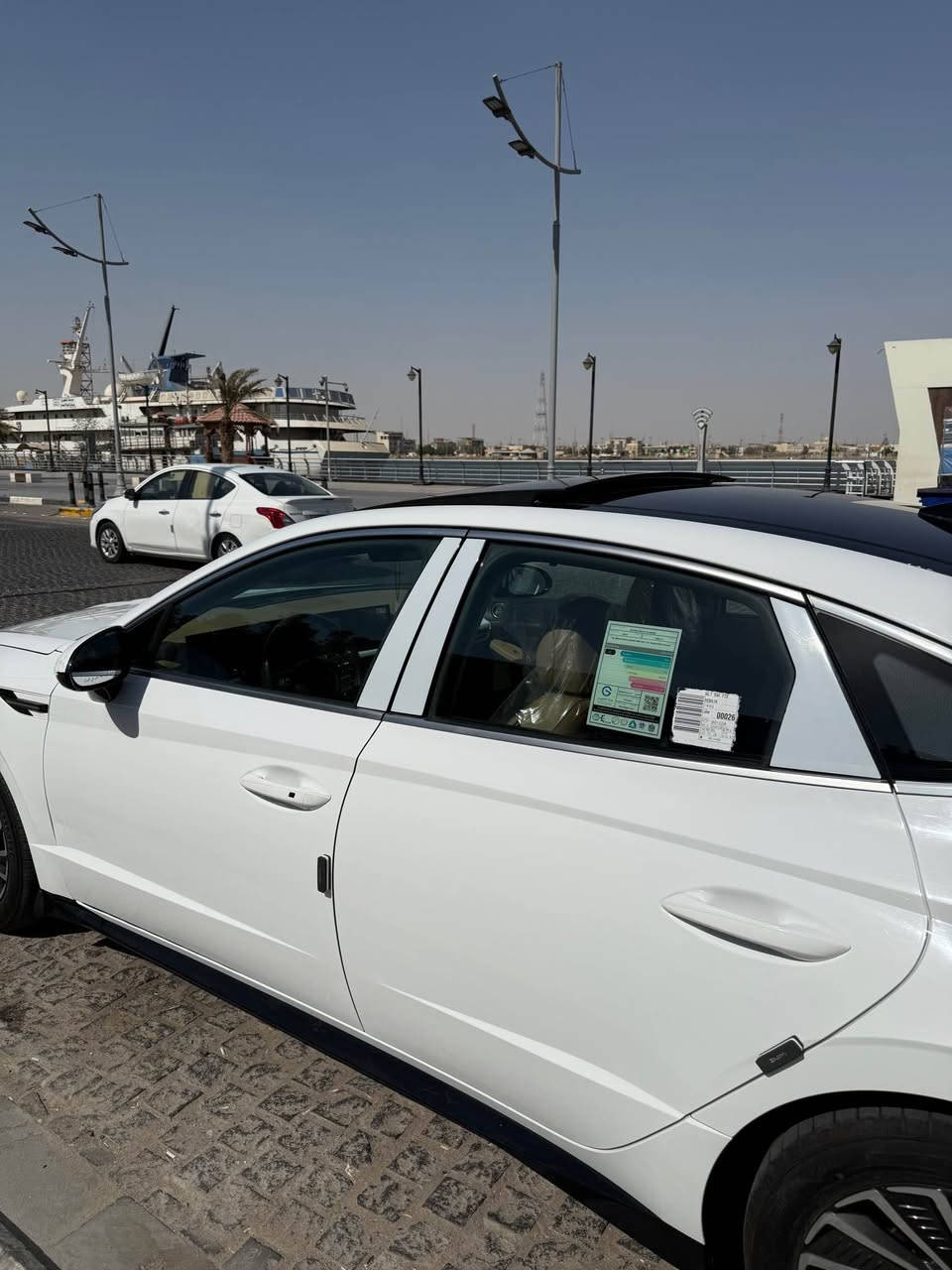 السلام عليكم 
سوناتا هايبرد 2024  ( خـليـجـي ) 
 اقساط ( نظام مقترض وكفيل ) راعيها بغداد
ماشيه ( 42 ) الف 
كفاله عامه / عده بارد بل باب سايق بدون زلغ 
فول مواصفات 1/1
حجم المحرك .. 2000 هايبرد 
بانوراما + بصمة + تشغيل عن بعد 
حساسات أمامية و خلفية 
لايت زينون + LED متصل 
بك لايت LED متصل 
دخول بصمة ذكي 
المرايا كهرباء 
هاند بريك كهرباء  
دشبول شاشة ديجيتال متصل 
شاشة Apple Car play and Android Auto 
كاميرا دوارة 
الانارة الداخلية LED ٦٤ لون متغير 
مقاعد جلد 
شفتات مقود مثبت السرعة Cruise 
المودات والاوامر الصوتية 
شاحن هاتف Wireless 
المقاعد الأمامية كهرباء 
تبريد شاشة مناخين منفصلين 
قطعتين تبريد 
أوتو هولد Auto Hold  
بردات أبواب خلفية 
تطعيم الدواخل ألمنيوم 
السعر … 205  
للاستفسار … ***********
                … *********** البصرة, العراق
