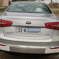 للبيع كيا گادنزا ٢٠١٤  الدولية رقم بغداد مواصفاتها معروفة vip بيها فقط...
