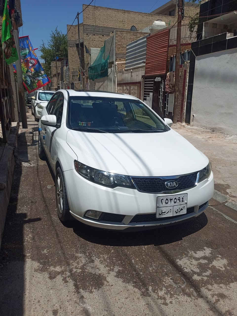 السلام عليكم كيا سيراتو موديل ٢٠١٣ سياره مكفوله ماعده قطعه صغيره بارد  سياره شاشه وكامره وحساسات وبنرامه بصمه ابواب و تشغيل تخم تأير جديد باتري جديد تبريد ثلج ٧السياره خير من الله سعر ١٠٥ رقم الهاتف *********** عنوان بغداد شعله الصدرين  بيها مجال
