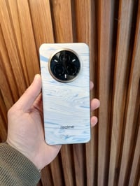 ريلمي 14 برو بلص ذاكره 512 لون ابيض متغير مع كامل ملحقاته 07739012617