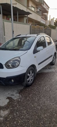 س ع سيارة جيلي باندا رقم بغداد جديد بااسمي وبيها بطاقة بنزين شرط تحويل...