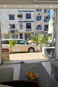 بنايه تجاريه للبيع في إسكان المنصور شارع مستشفى الطفل مساحتها 114م واج...