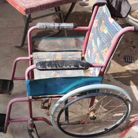 كرسي معوقين • مساعدة حركة