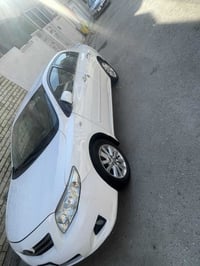 كورلا2009 محرك18، 1قطعه باب خلفي صبغ بدون معجون بدون ضربة،سعر123$ ر.م/...