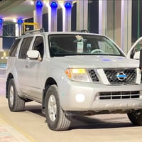 نيسان باڤندر  2009   رقم واسط نگليزي مداور ثاني يوم   مكينه وكير كرتون...