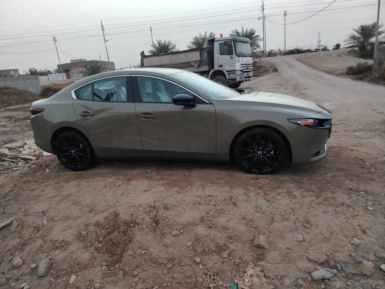 سلام عليكم سياره مازدا ثريه 2024 تيربو فور ويل مكينه ثنين ونص تيربو المرغوب سياره رياضيه  سياره جاهزه من كلشي  الف ماذب عليها بيع ومروس بسياره ٧راكب مكاني البصره قضاء المدينه رقم ***********
