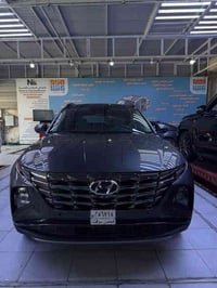 توكسون هايبرد هي نسخة كاملة الهجين (Full Hybrid) من SUV الهيونداي المد...