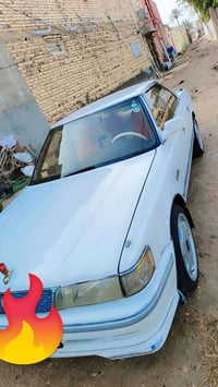 سيارة شيزر بأسمي رقم انكليزي سنويه 28 مكفول من كلشي موديلها 91 المداور...