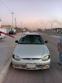 اكسنت • ١٩٩٧ • رقم بغداد