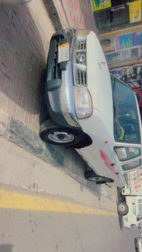 بيكم نيسان رقم كربلاء 2010  سياره جاهزه من كلشي دوشمه جديده مكينه وكير...