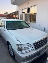 ٢٠٠٣ • أصفر • نوافذ كهرباء