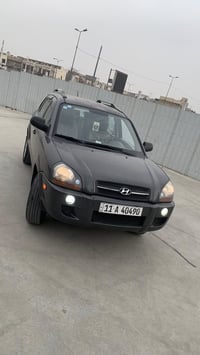 توسان ٢٠٠٩ محرك ٢٠٠٠ دوش   وارد امريكي   بيها طخه بسيطة بشباك وبنيد مب...