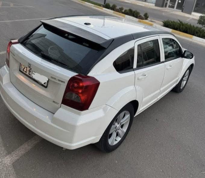 السلام عليكم دوج كاليبر 2010 رقم وسنويه جديد 2030 وهزه جديد تبريد شغال ثلج محرك كير كله مضبوط ولا كلوب مشتغل السياره جديده وجاهزه بدون اي مصرف صبغ 3 قطع مكان السياره بغداد السعر 68  للاستفسار ***********
