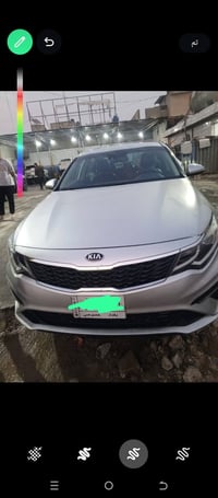 كيه اوبتيما للبيع موديل 20 معوقين تنفك شهر 10 مرقم بغداد 125 077359109...